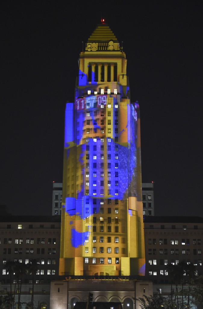 Los Angeles City Hall appears to spin as 3-D digital mapping projections highlight New Year's Eve celebration at Grand Park in the Californian city hoping to host the Olympics for a third time in 2024 ©Getty Images