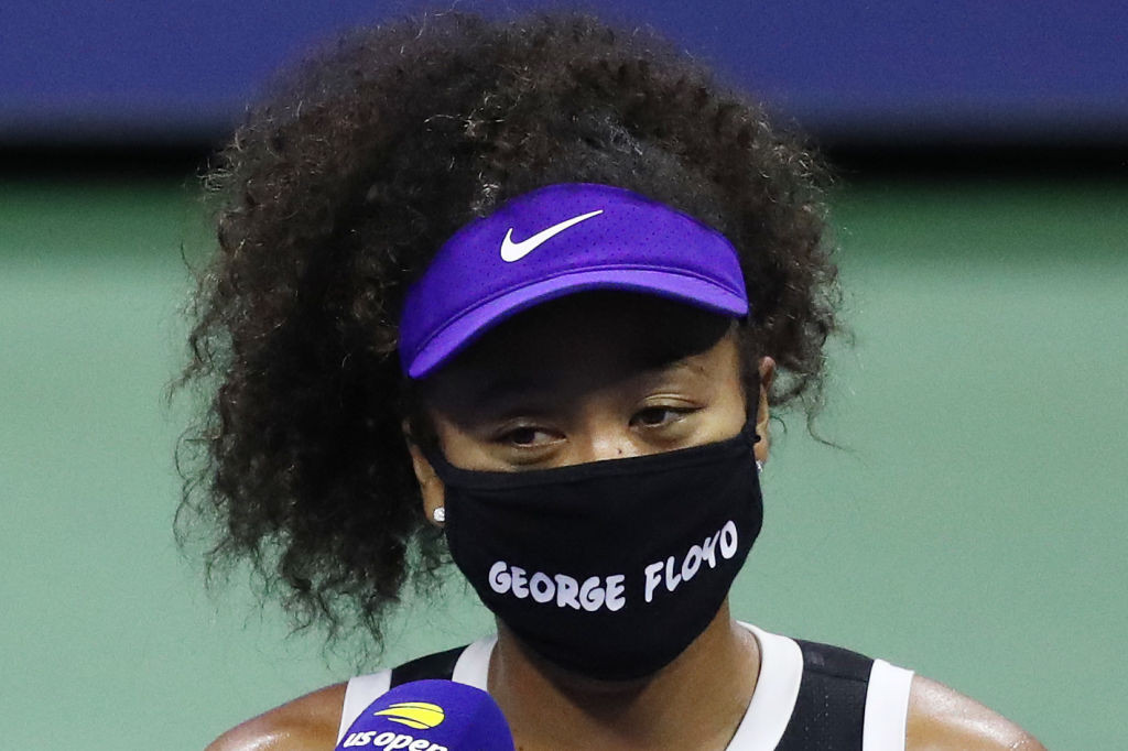 Naomi Osaka wore a face mask bearing the name of George Floyd in her post-match interview ©Getty Images