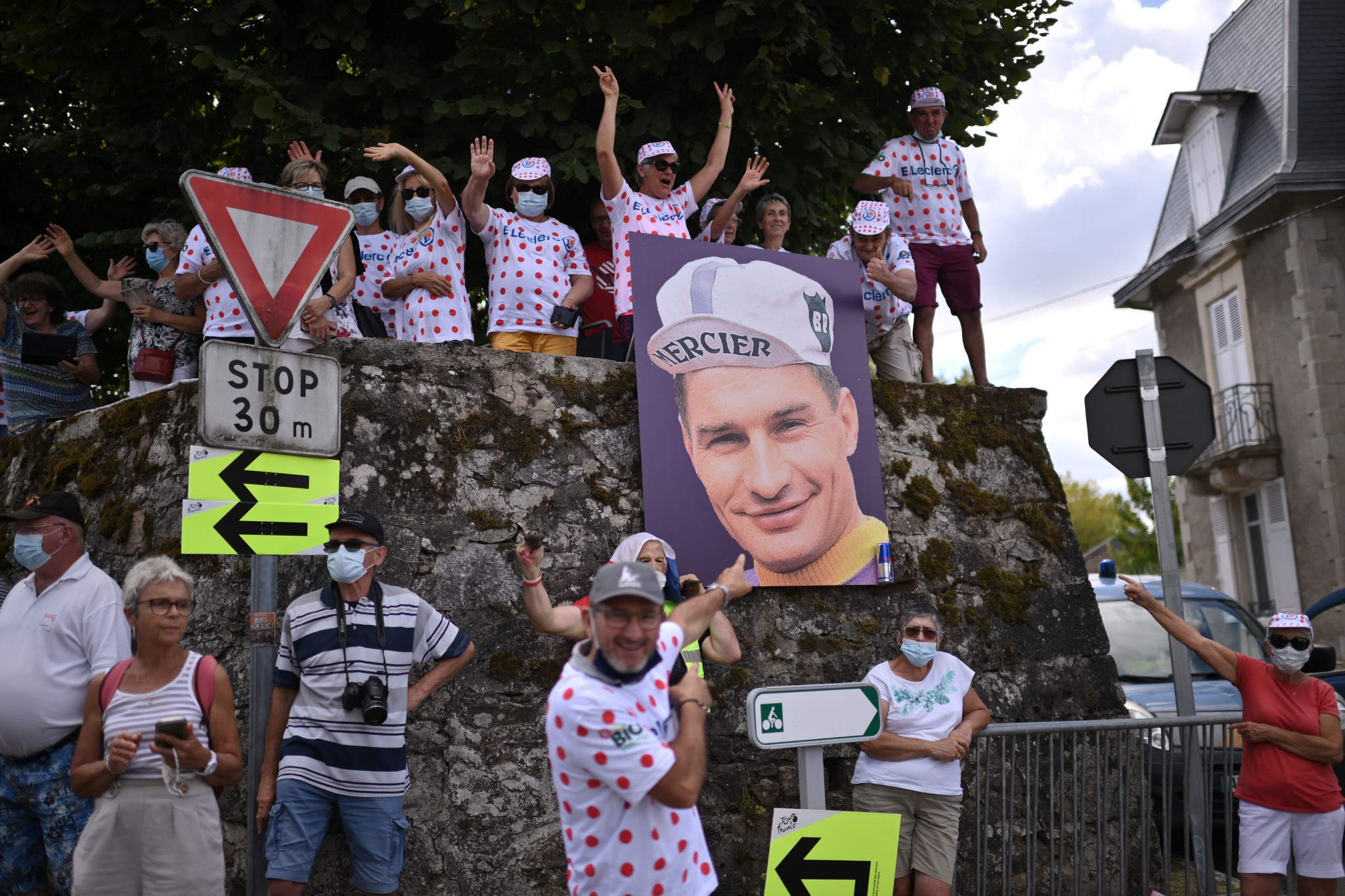 Fans display a tribute to French rider Raymond Poulidor 