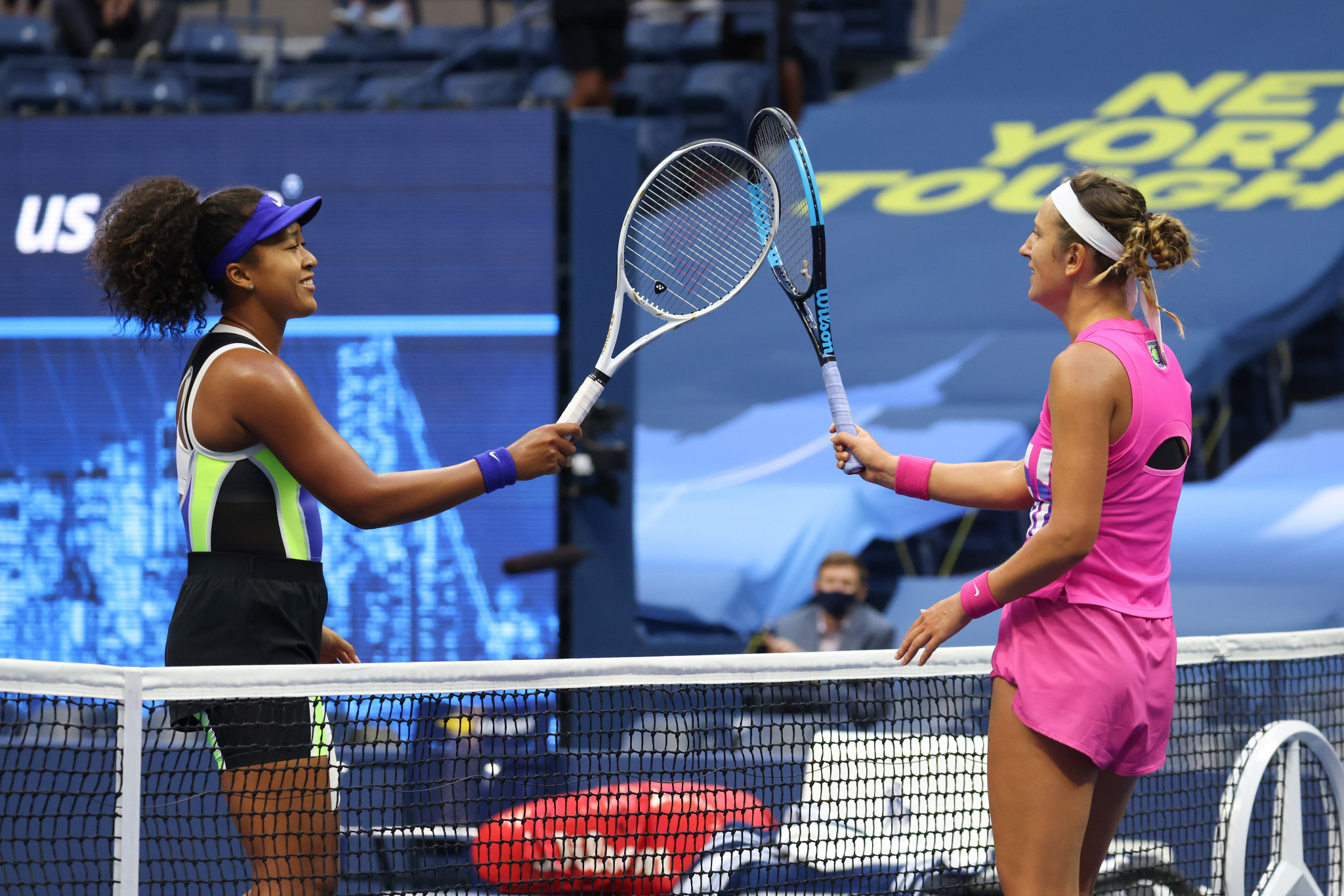 Naomi Osaka (left) and Victoria Azarenka tap rackets following a memorable final won by the Japanese player in three sets ©Getty Images