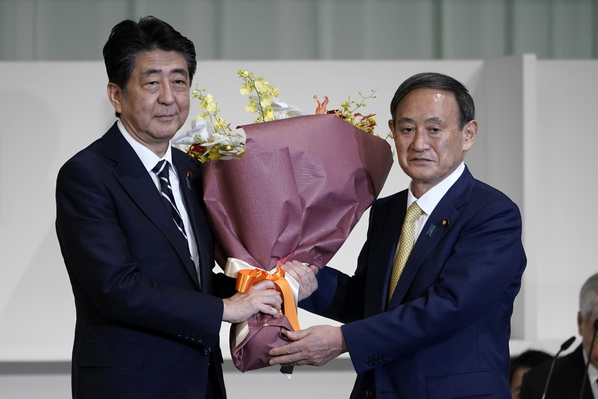 Shinzō Abe, left, has been replaced by Yoshihide Suga, right, as Japanese Prime Minister ©Getty Images