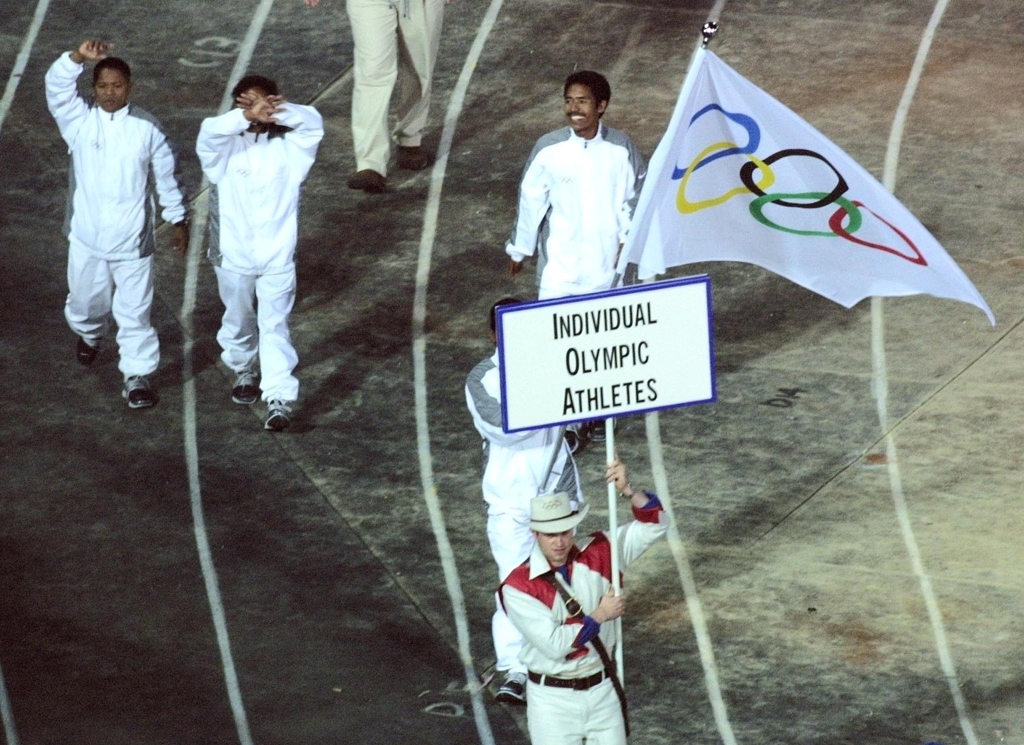 Athletes from East Timor march during the Sydney 2000 Olympic Games Opening Ceremony, where they competed as Individual Olympic Athletes ©Getty Images