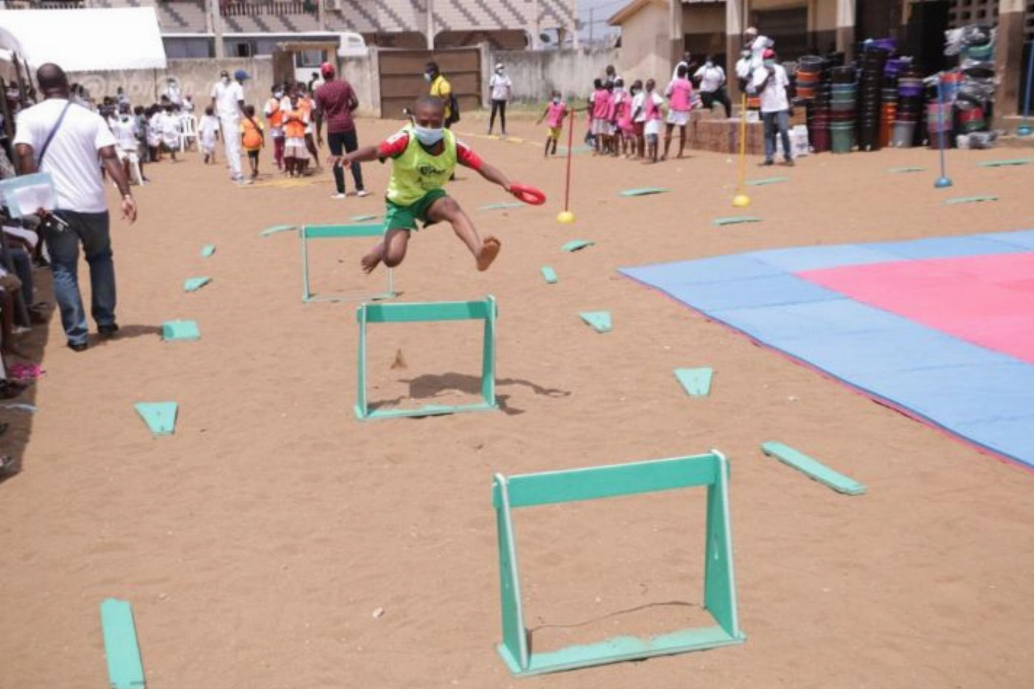 Ivory Coast NOC makes donations to schools as part of Olympic Day activities