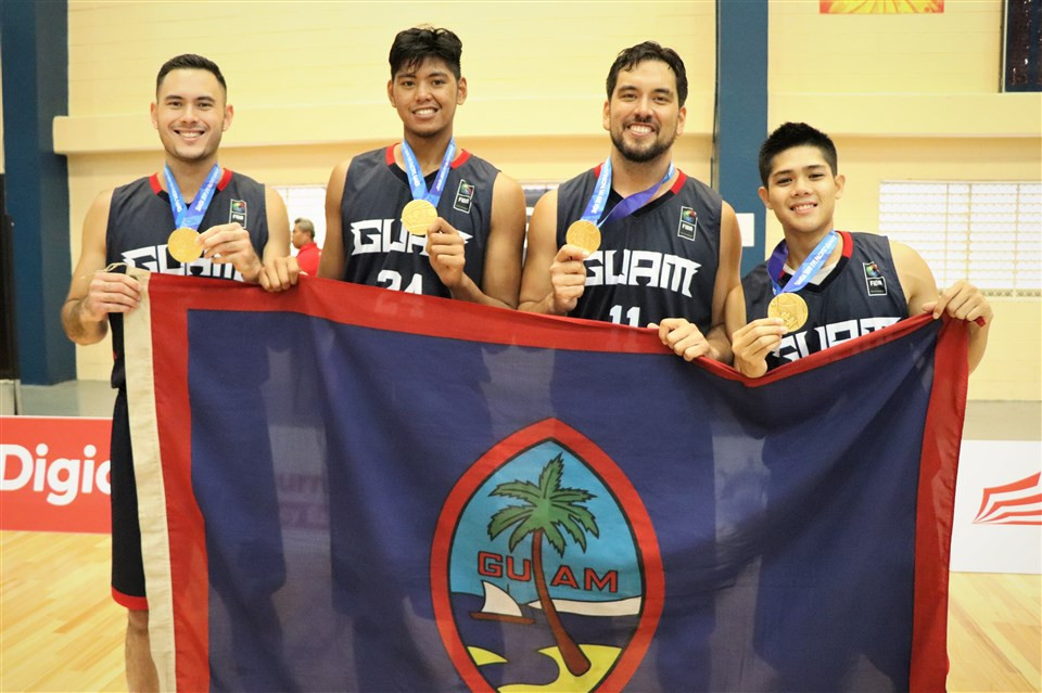 Seve Susuico, second right, captained Guam to the first Pacific Games 3x3 gold medal at Apia in Samoa in 2019 ©FIBA