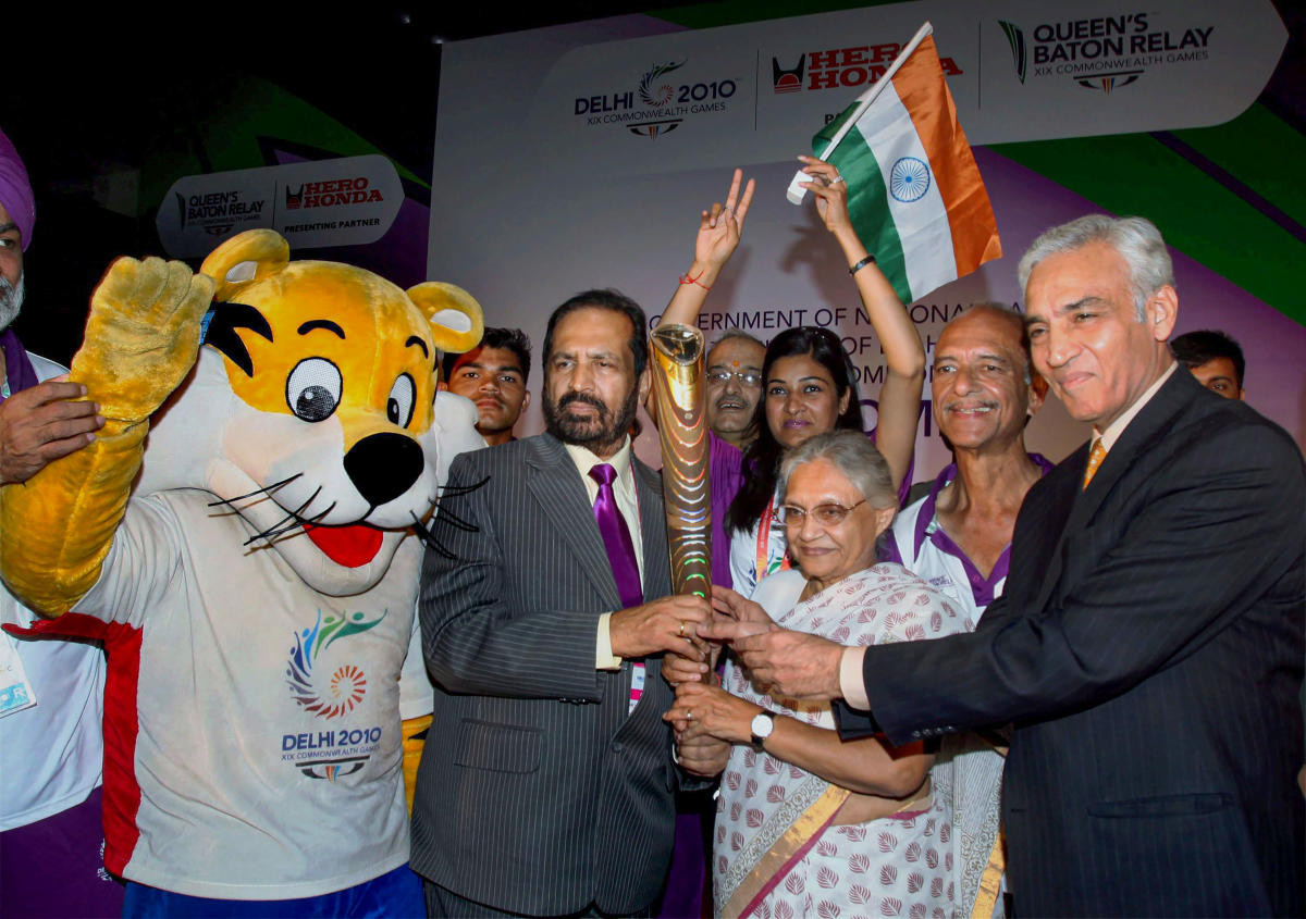 Delhi 2010 chairman Suresh Kalmadi, second left, was charged with conspiracy, forgery and misconduct after the Commonwealth Games and spent 10 months in jail ©Getty Images
