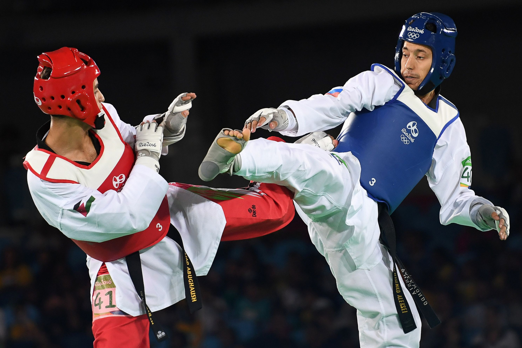 Alexey Denisenko, right, won Russia's fourth Olympic medal in taekwondo when he clinched the silver in the men's under-68kg category ©Getty Images 