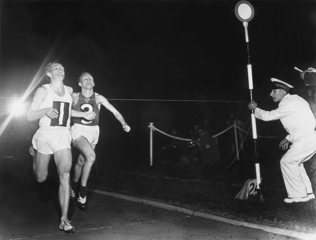 Chris Chataway, pictured beating Russia's Vladimir Kuts and the 5,000 metres world record at White City in 1954, was a self-confessed smoker during his track career ©Getty Images