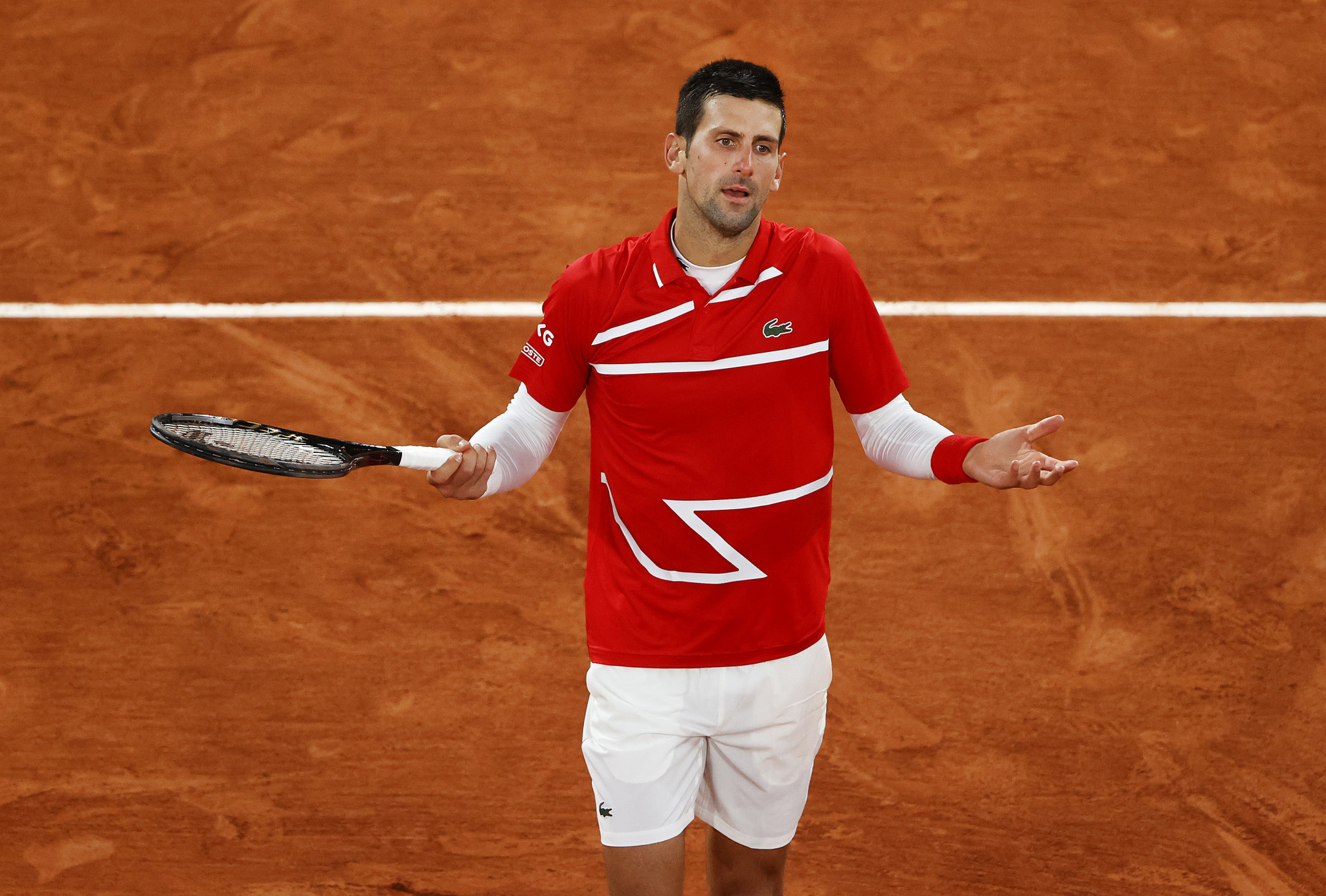 Djokovic continues unblemished record as seeds progress to French Open quarter-finals