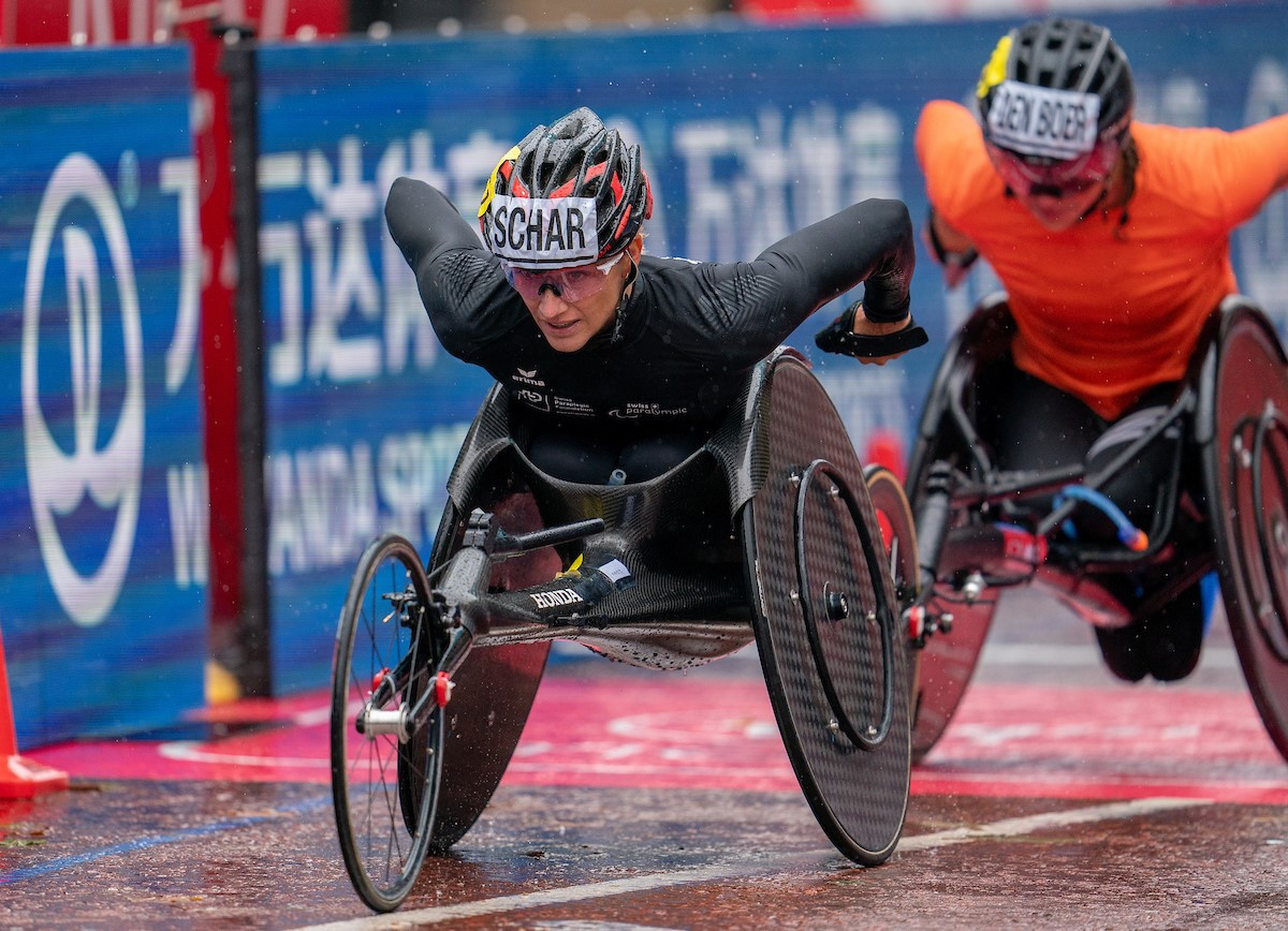 Weir Archer Academy and Wheelpower receive sprint prize money from London Marathon wheelchair race