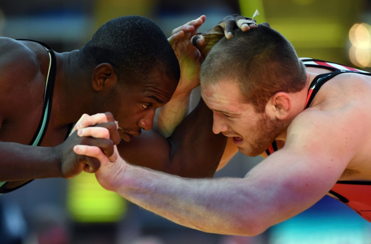 Kyle Snyder (right) became the United States’ youngest-ever wrestling world champion in September
