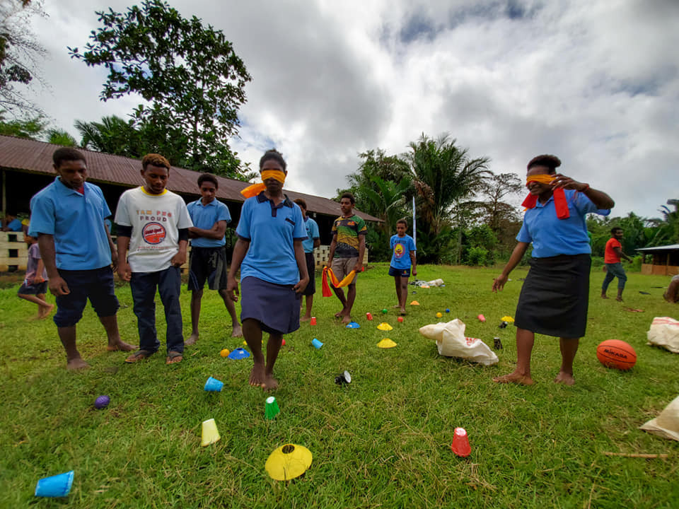 Students at Kitomave SDA Primary participate in activities as part of the programme ©PNGOC