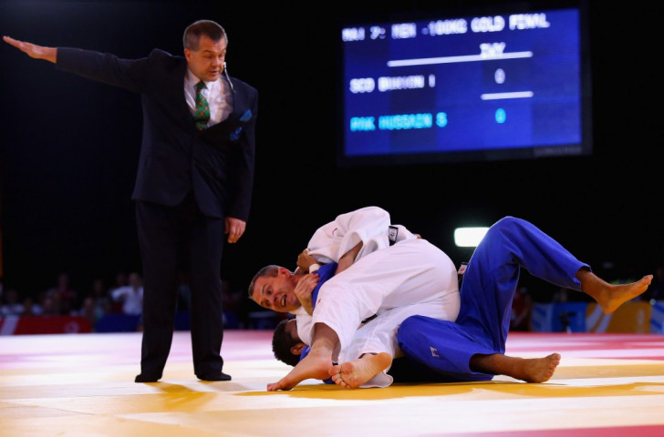 Euan Burton won gold in the 100kg category at Glasgow 2014