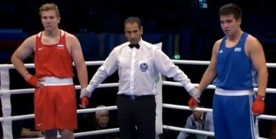 An international referee, Ramie Al-Masri, centre, wants to ensure the highest possible standing of judging and officiating if he is elected AIBA President ©YouTube