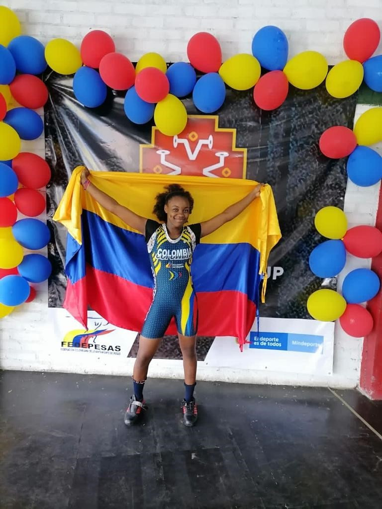 Colombia's Dubaney Sinisterra won two titles in the women's 59kg ©Colombia Weightlifting