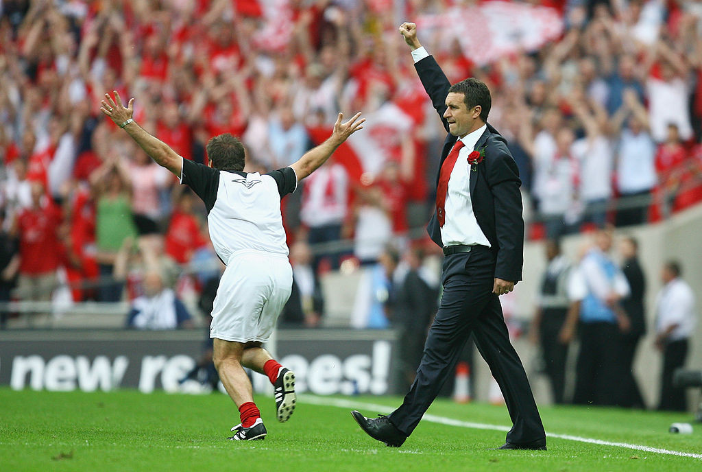 Ebbsfleet United's head coach Liam Daish salutes victory in the 2008 FA Trophy final in the year when supporters paid £35 each to take over the club and much of its running  ©Getty Images