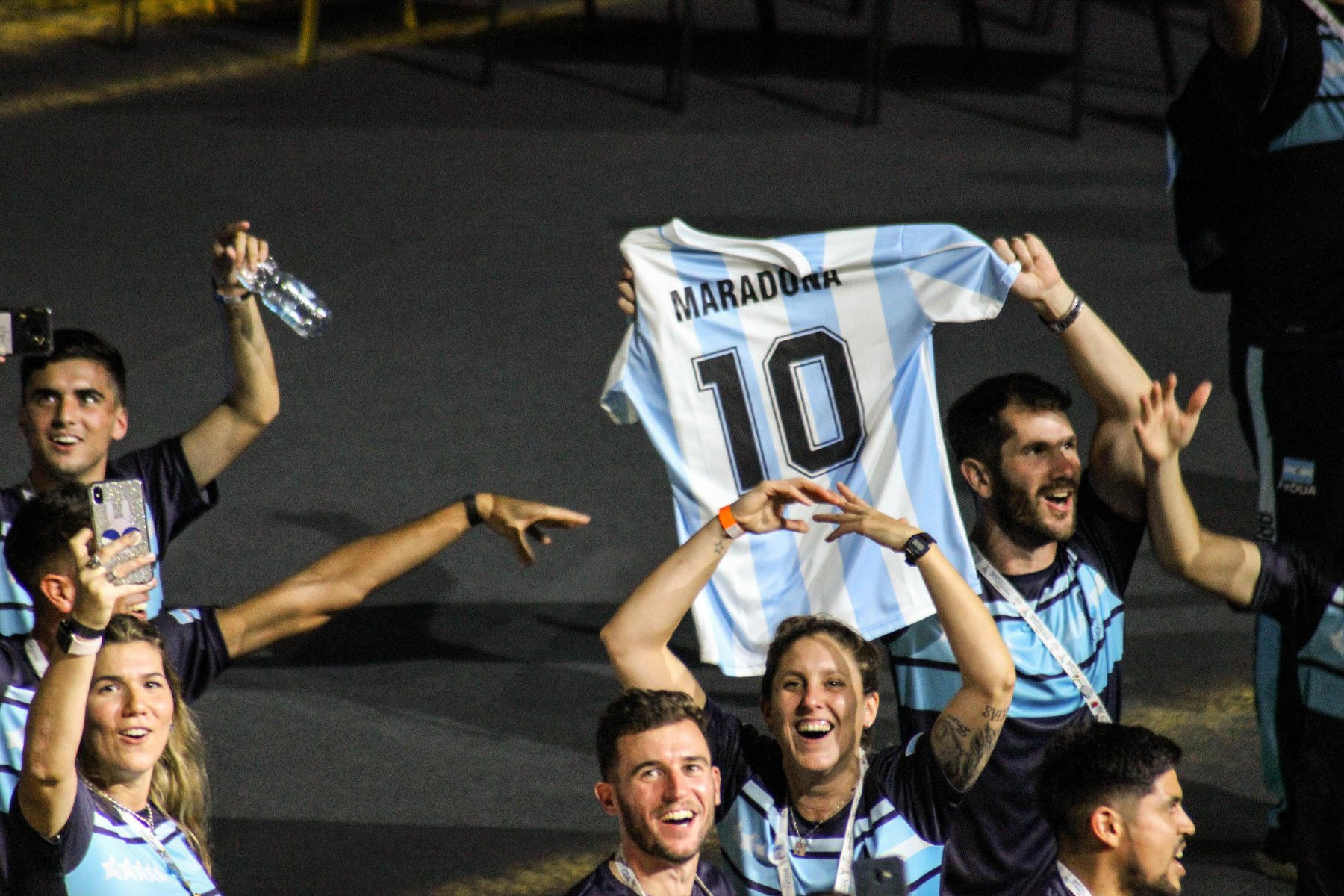The Argentinian team held aloft a Diego Maradona shirt when they entered the San Paolo Stadium during the Naples 2019 Opening Ceremony ©Naples 2019