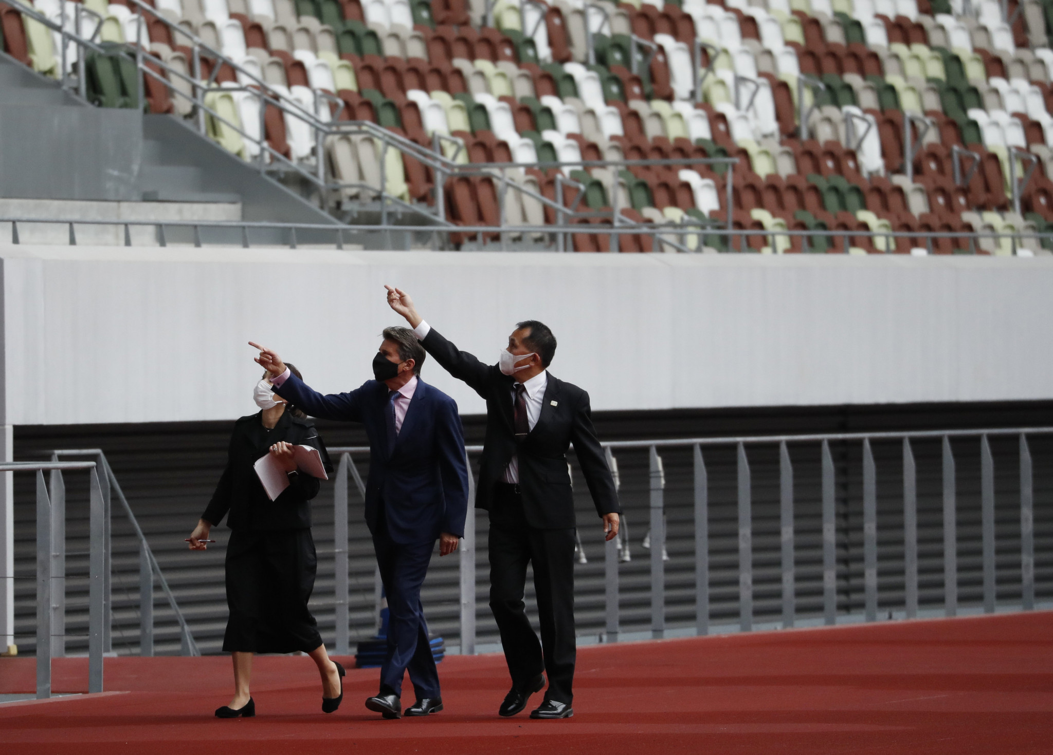 World Athletics President Sebastian Coe, centre, visited the Olympic Stadium in Tokyo in October ©Getty Images