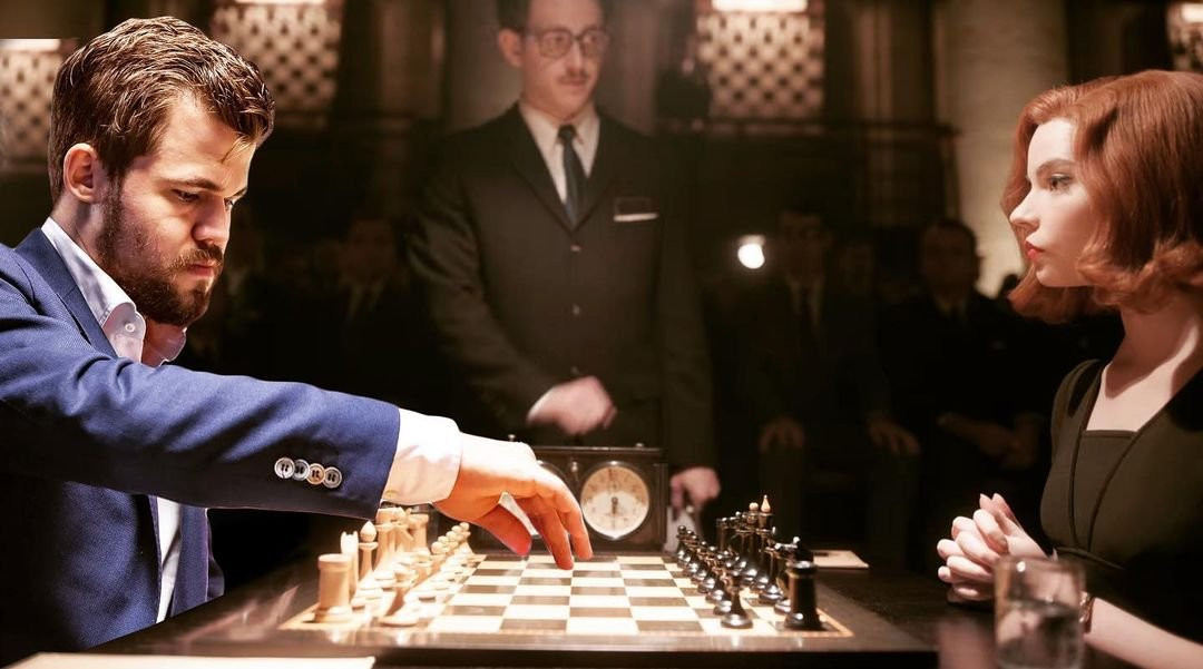 Norwegian grandmaster Magnus Carlsen is one of many fans of The Queen's Gambit, and shared a doctored photo of him playing chess against the main character Beth Harmon ©Magnus Carlsen/Instagram