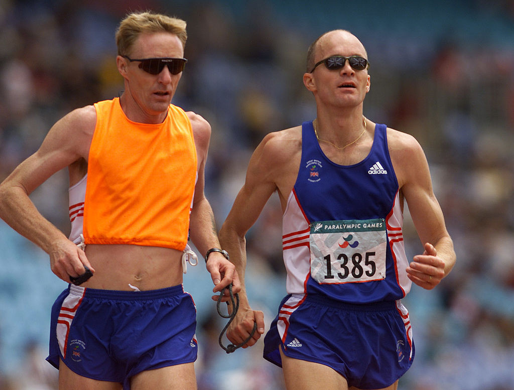 Bob Matthews, right, pictured with his guide Paul Harwood at the Sydney 2000 Paralympics, where he won a gold and two silvers ©Getty Images