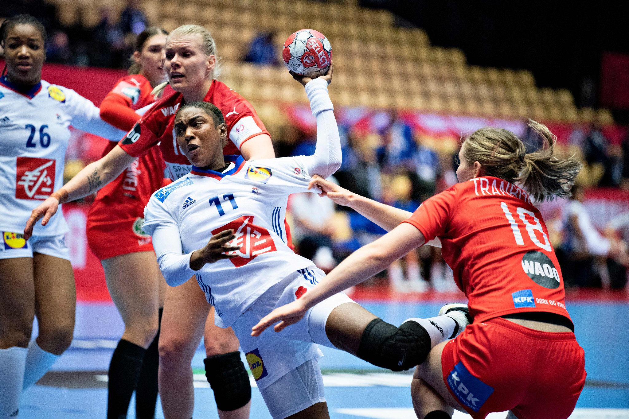 France (in white) finished the first stage of EHF Euro 2020 with a perfect three wins after defeating hosts Denmark today ©Getty Images