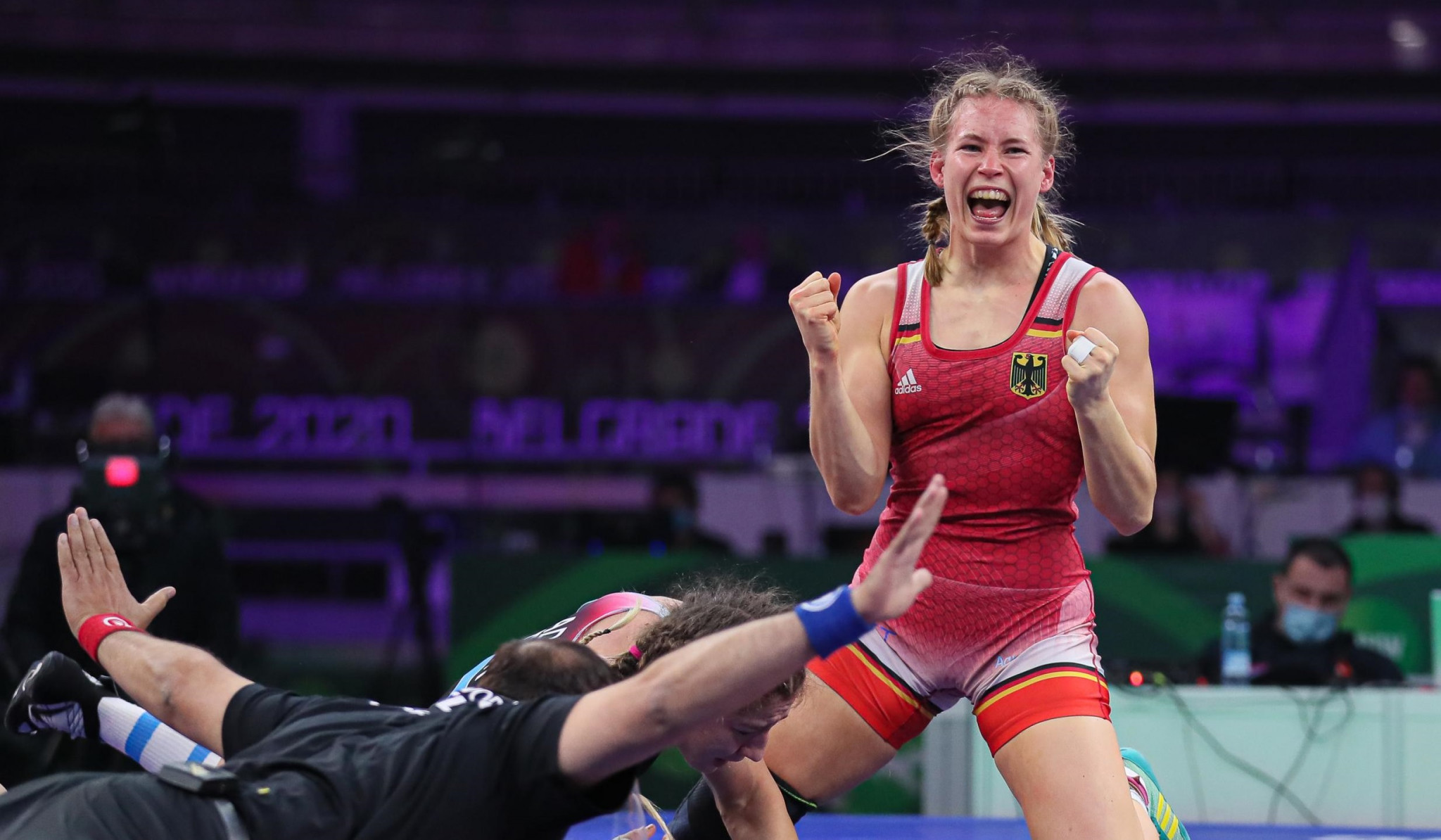 Aline Rotter Focken of Germany (red) celebrates winning women's 76kg gold ©UWW