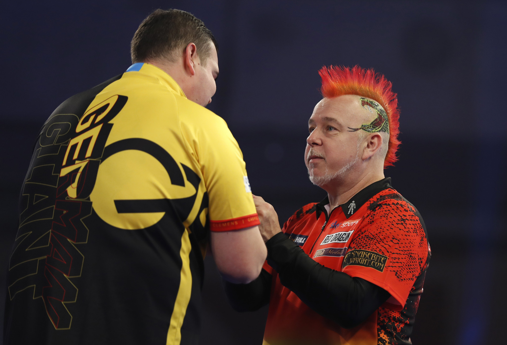 Peter Wright, right, is out of the World Darts Championship ©Getty Images