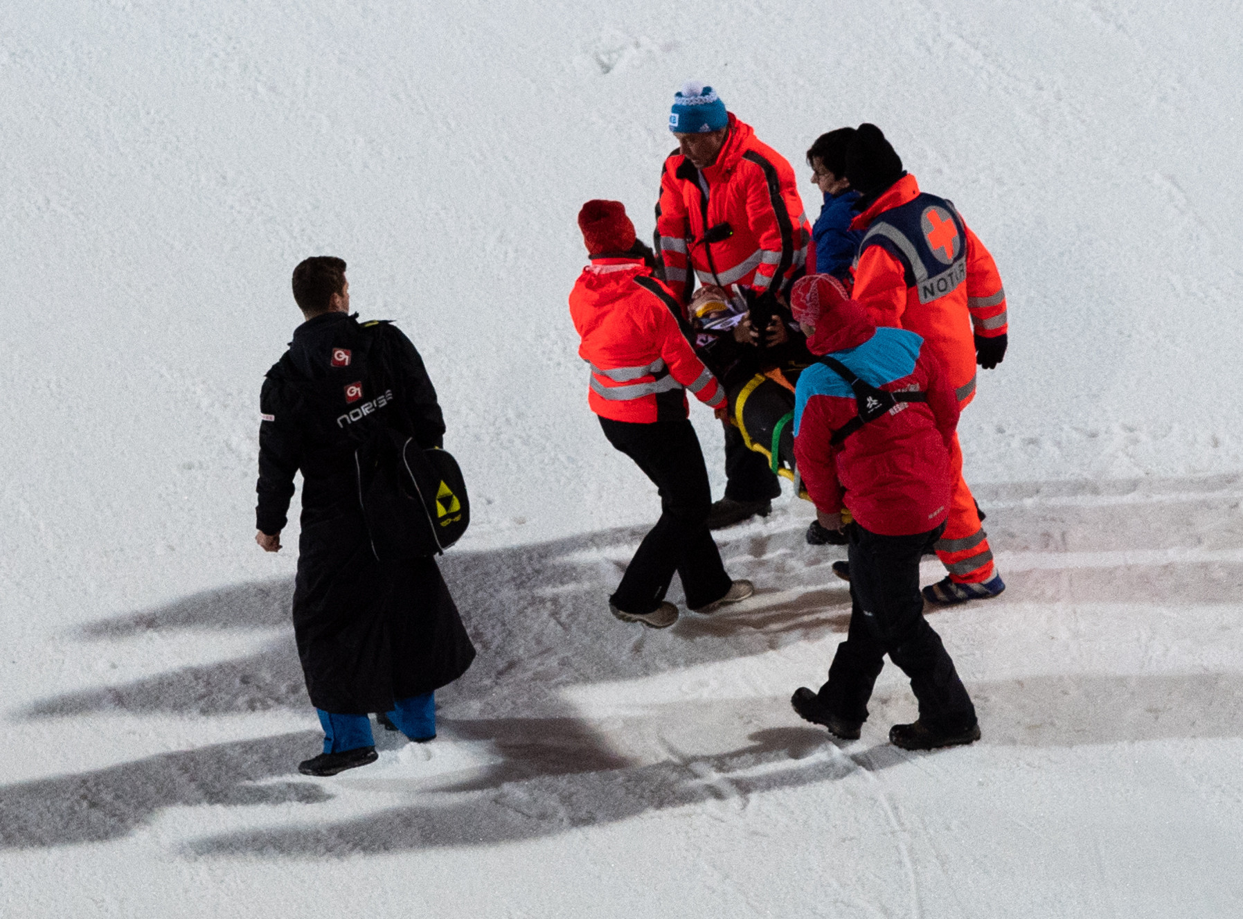 Thomas Aasen Markeng is carried by medics after injuring his knee at a World Cup event in Klingenthal in Germany ©Getty Images
