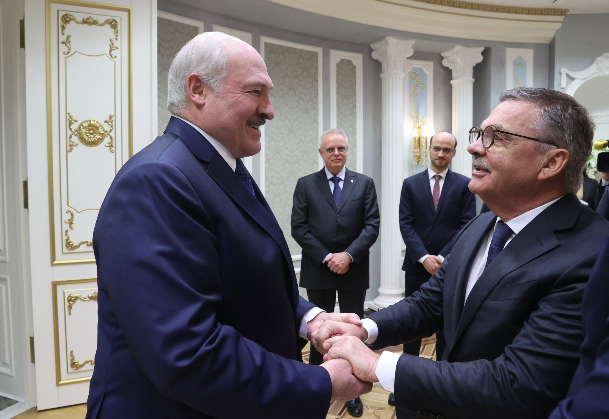 IIHF President René Fasel greeted Belarusian President Alexander Lukashenko warmly at the start of their meeting ©Getty Images