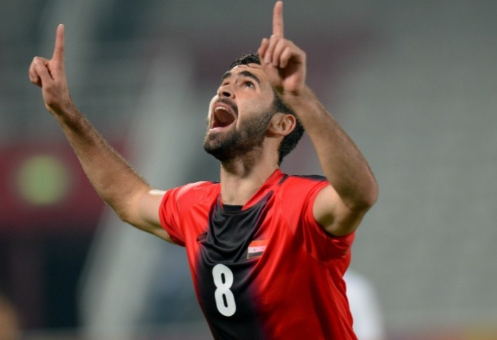 Omar Kharbin celebrated his 22nd birthday with a brace in Syria's 3-1 win over China