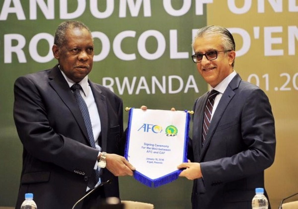 CAF and acting FIFA President, Issa Hayatou, and AFC President Shaikh Salman signed the MoU in Rwanda