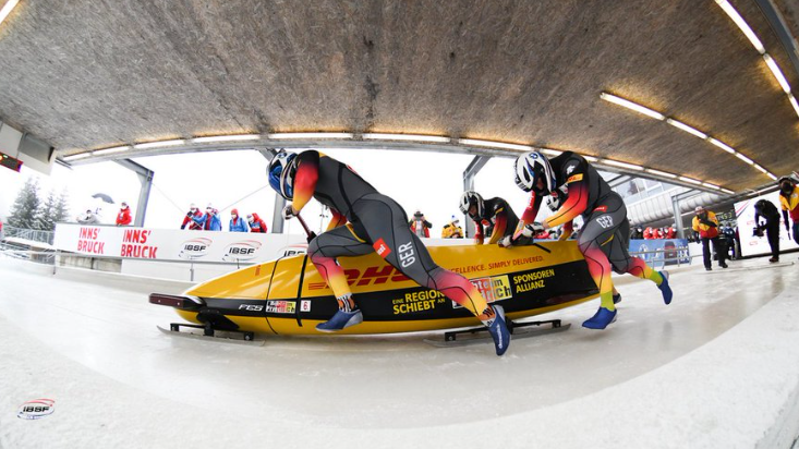 Francesco Friedrich and crew en route to a final win at Innsbruck and a third overall IBSF World Cup four-man bobsleigh title ©IBSF