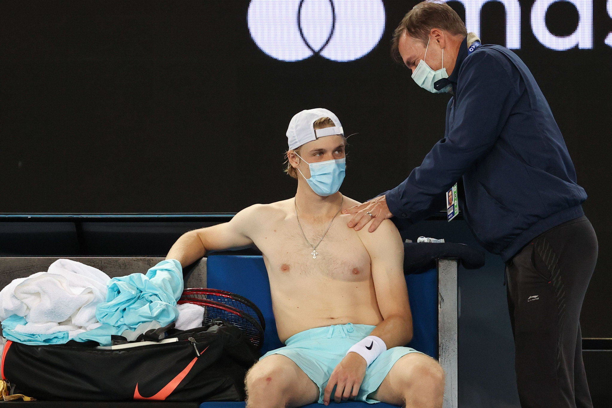Canada's Denis Shapovalov removes his top during a medical time-out ©Getty Images