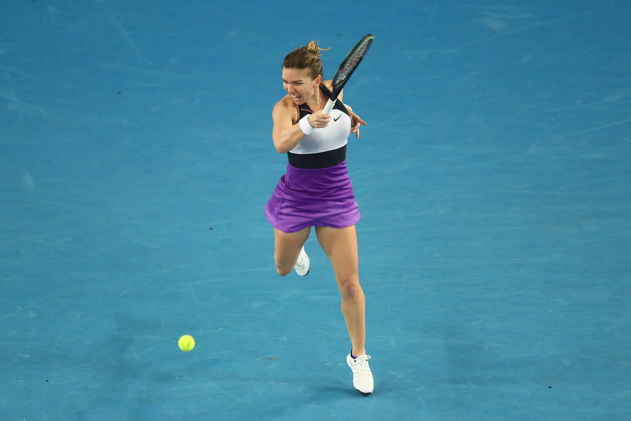 Halep battles back from brink to prevail in deciding set thriller at Australian Open