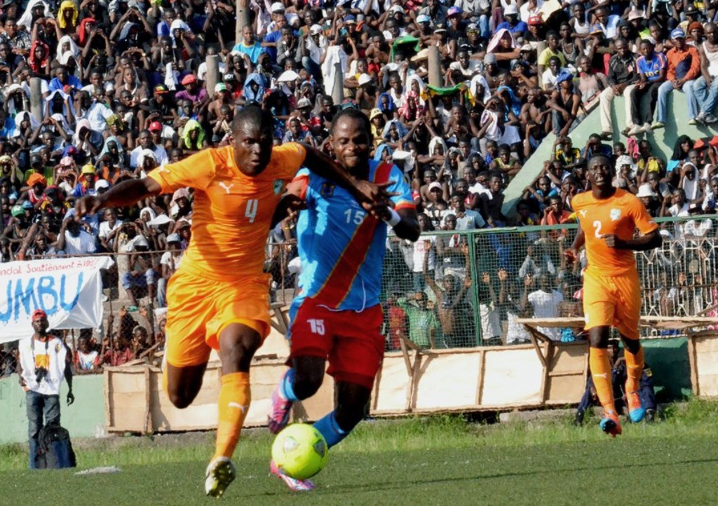 Guy Lusadisu, right, opened the scoring for the Congolese