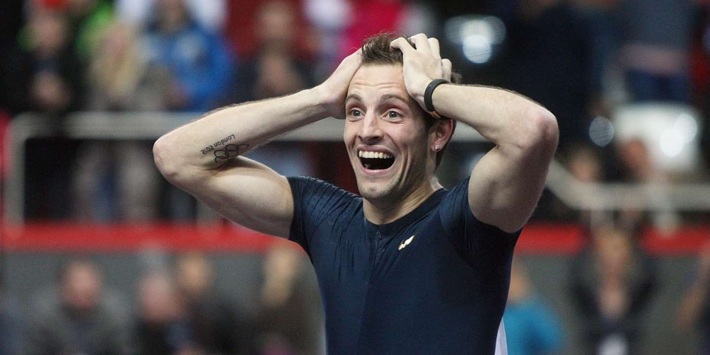 Renaud Lavillenie struggles to take in the fact that he has just broken Sergey Bubka's longstanding world pole vault record with an effort of 6.16 metres at the Donetsk Arena in February 2014 ©Getty Images