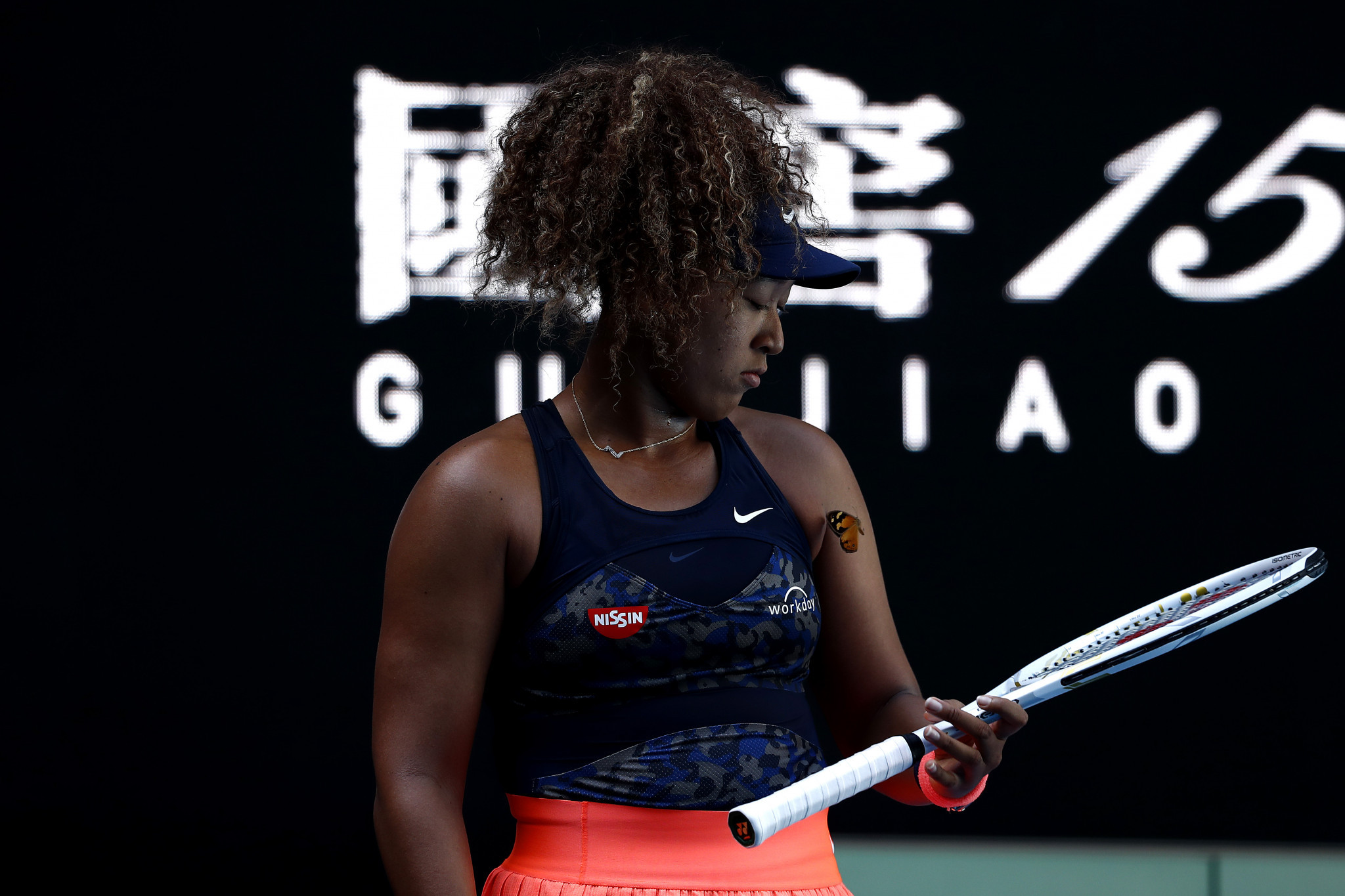 Naomi Osaka had a close encounter with a butterfly during her third round win over Ons Jabeur ©Getty Images