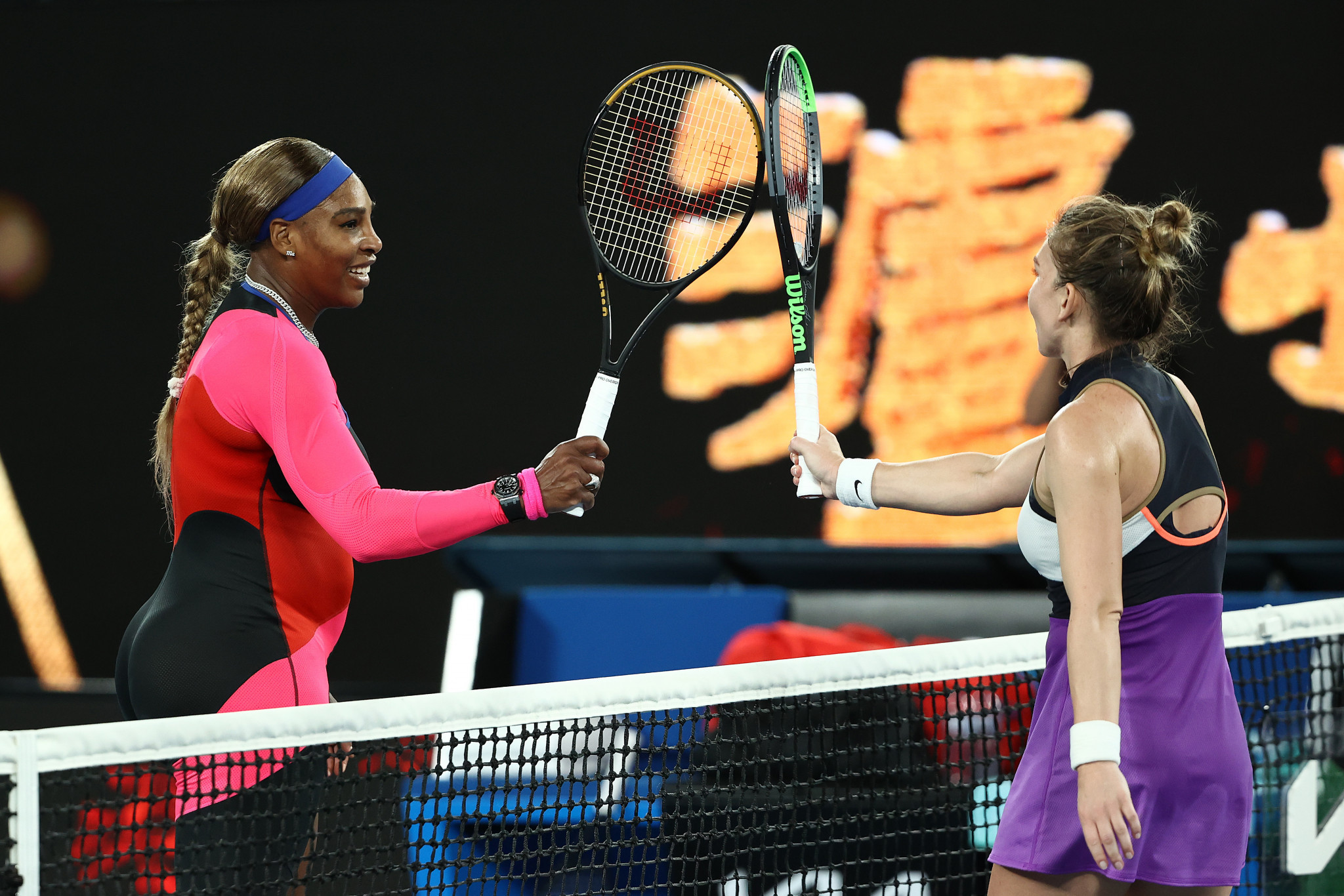 Serena Williams, left, defeated Simona Halep to reach the final four of the Australian Open ©Getty Images