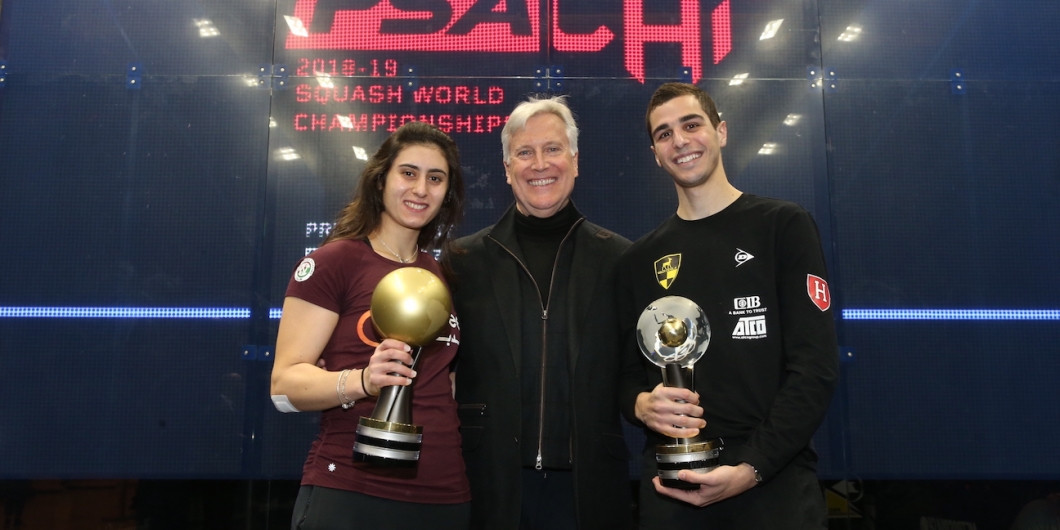 PSA world champions Nour El Sherbini, left. and Ali Farag, right, pictured with title sponsor Mark Walter will return to Chicago in July to defend their titles in an event offering $1million in prize money ©PSA 