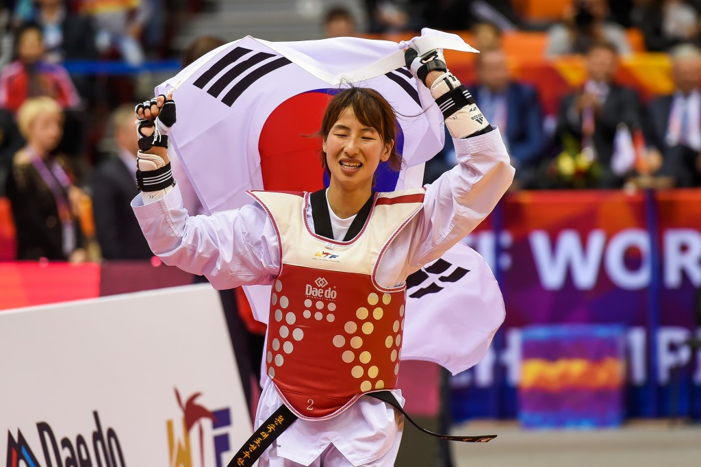 Ha Min-ah celebrates after her shock victory over Wu Jingyu of China ©WTF