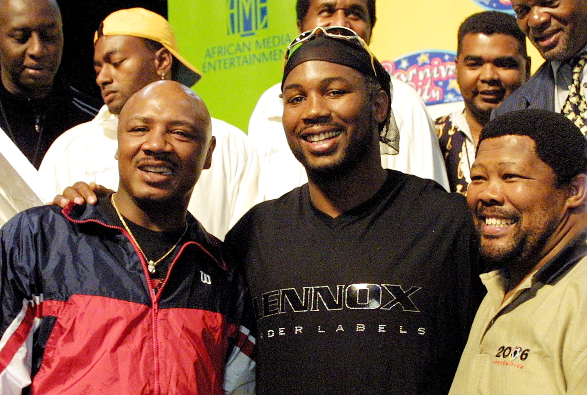 Lennox Lewis, centre, is among those to have paid a glowing tribute to Marvelous Marvin Hagler, left ©Getty Images