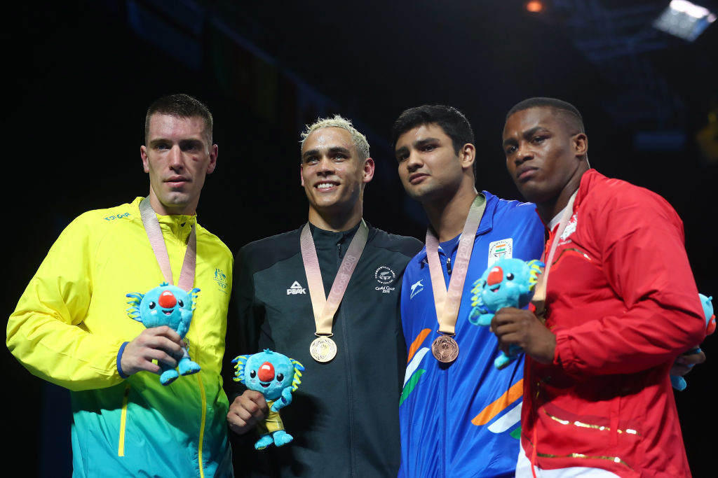 New Zealand's David Nyika, pictured second left after winning a second Commonwealth Games boxing title at Gold Coast 2018, is set to make his Olympic debut in the heavyweight division this summer ©Getty Images