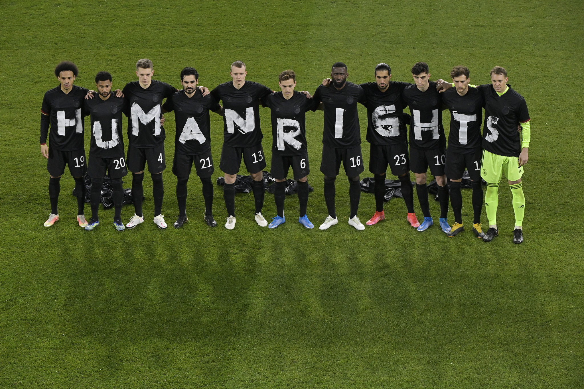 Germany's players lined up to spell out the words 