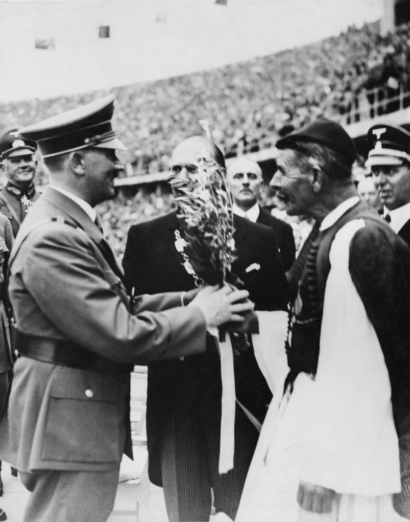 Forty years after his landmark Olympic marathon victory, Spyridon Louis was at the 1936 Berlin Games to present Adolf Hitler with a laurel wreath from the sacred grove of Olympia ©Getty Images