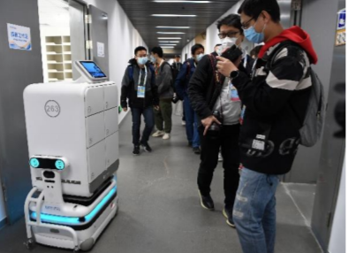 Robots delivering equipment and documents at the National Indoor Stadium as part of the testing of ice venues for the Beijing 2022 Winter Games ©Beijing 2022