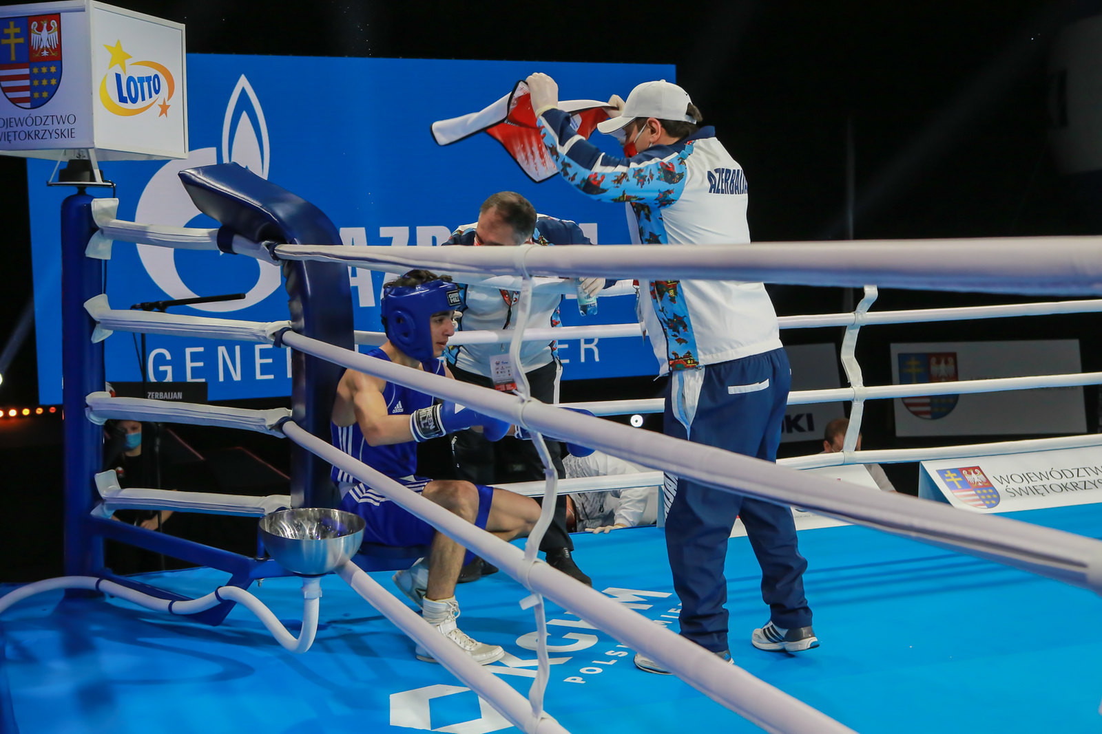 A boxer from Azerbaijan receives instructions from his team during a break between rounds ©AIBA