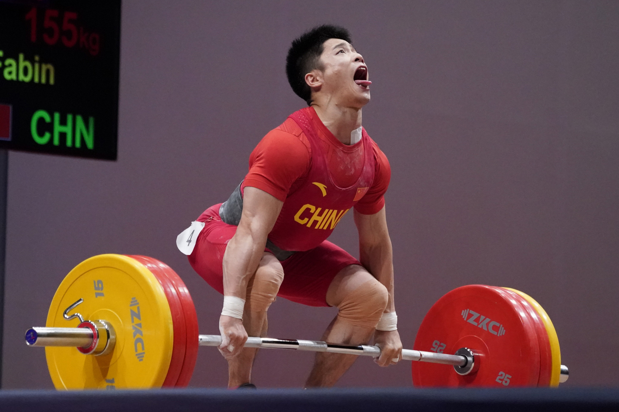 Li Fabin of China was a clear winner in the men's 61 kilograms category, but fell just short in his quest for a world record ©Getty Images