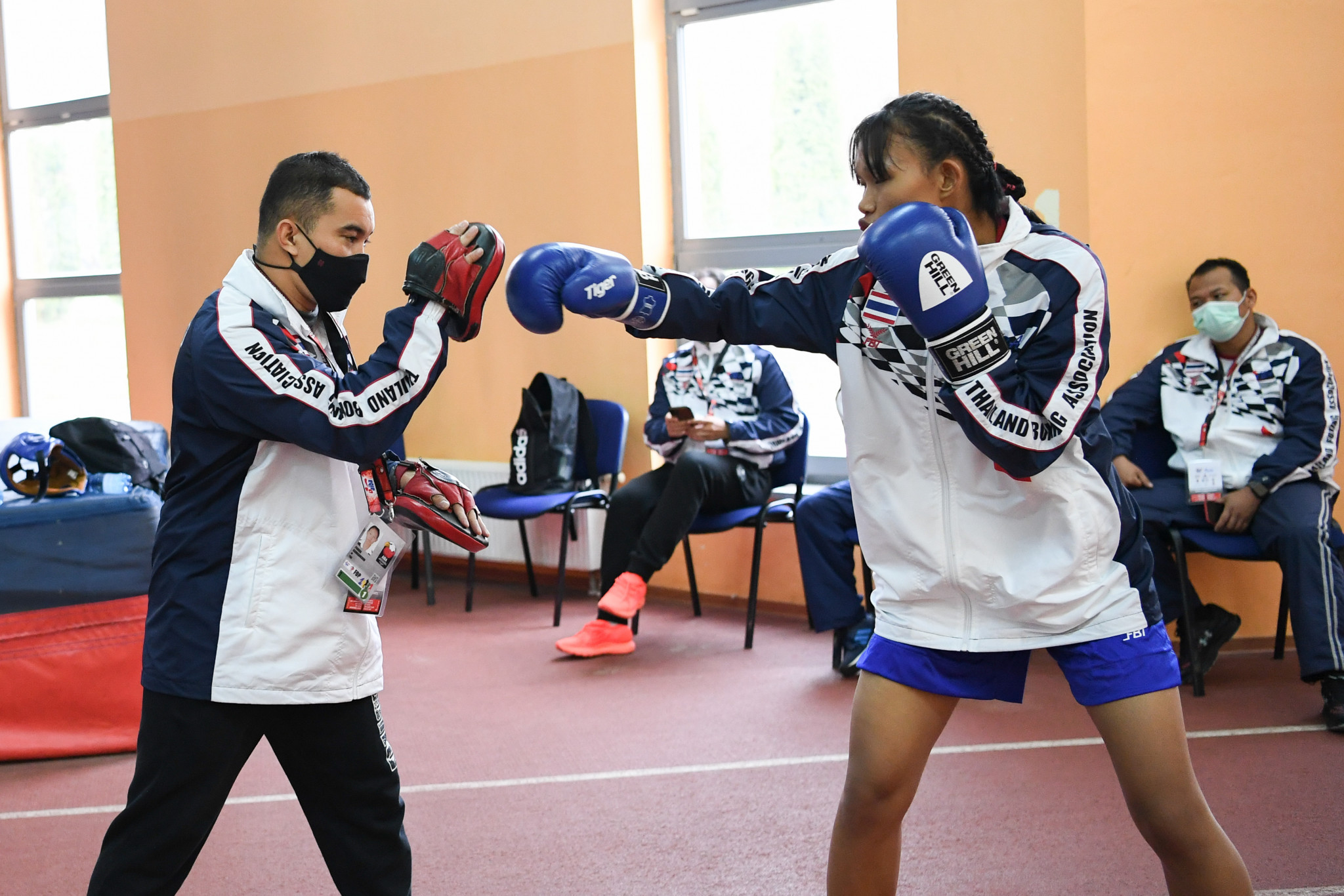 A boxer from Thailand warms up with her support team backstage at the AIBA Youth World Championships ©AIBA