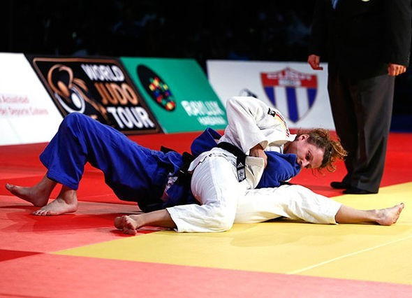 Germany's Mareen Kraeh justified her top seed status by winning gold in the women's under 52kg category