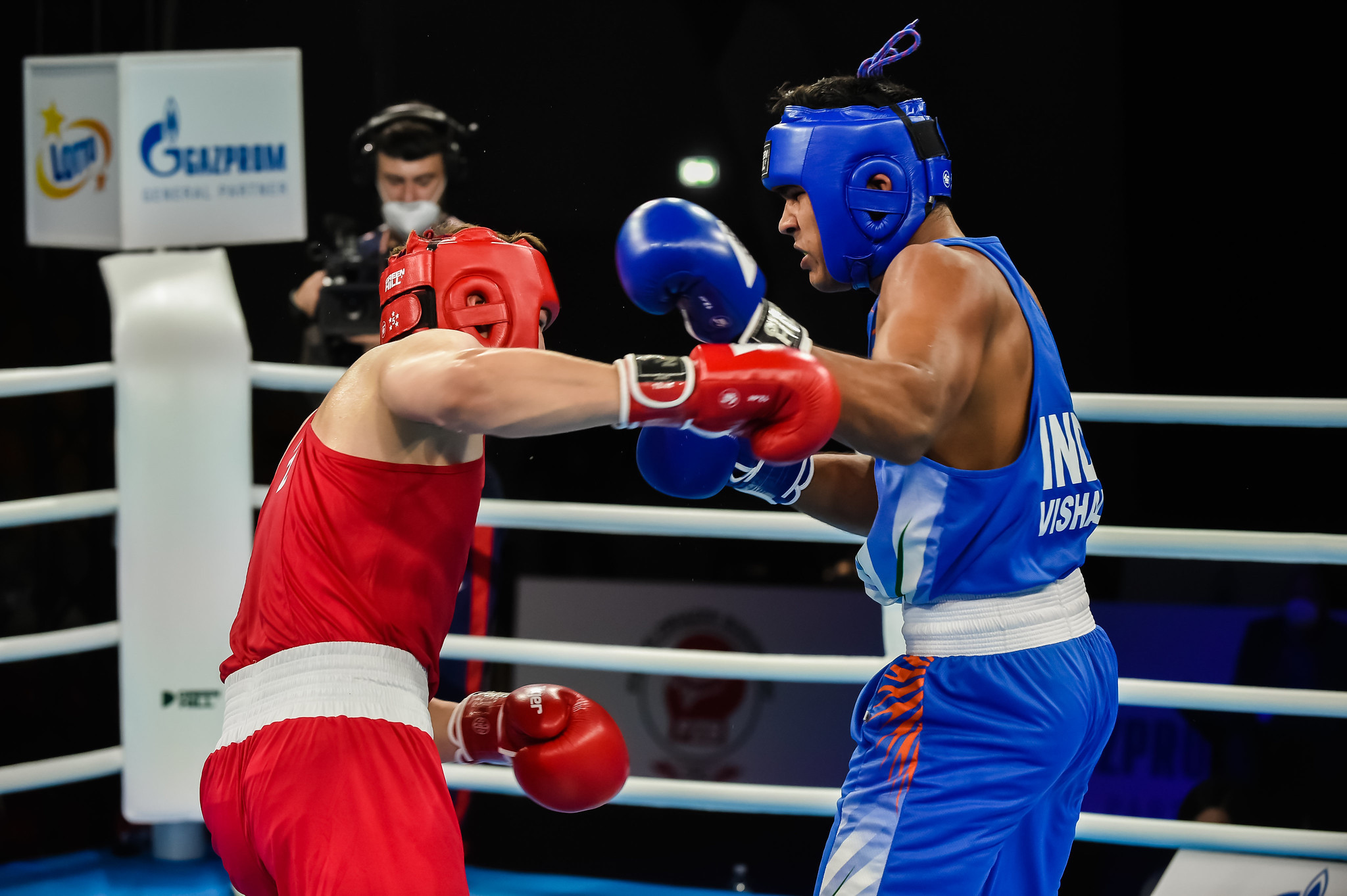 Vishal Gupta, in blue, was one of them in the men's 91kg heavyweight division, beating Kazakhstan’s Madi Amirov ©AIBA