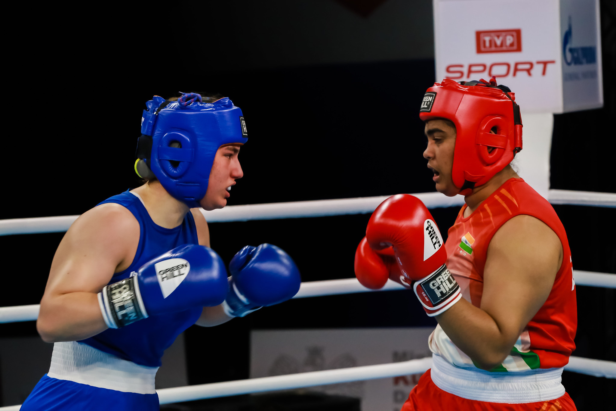 Alfiya Tarannum Akram Khan Pathan, in red, was another, beating home fighter Oliwia Toborek on three of the five judges' scorecards to earn a place in the women's heavyweight gold-medal match ©AIBA